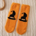 Fuzzy coral fleece Halloween socks in bright orange with a black witch hat pattern - One Size / Orange