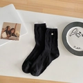 Sweet black mid-calf socks with white ruffled lace trim and decorative silver button - Black Heart