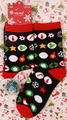 Detailed view of black and red Christmas socks with holiday patterns and brand tag - 37-43 / Black