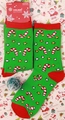 Detail of knit Christmas socks with candy cane patterns and holiday packaging card - 37-43 / Green