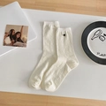 Cream white mid-tube jacquard socks with button detail and delicate floral texture - White Clover