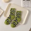 Green leopard print coral fleece mid-calf socks for winter warmth and cozy home wear - One Size / Green