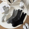 Detailed view of five pairs of rib-knit crew socks with dog patches in various colors - One Size / Mixed Colors