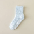 Light blue fuzzy socks with non-slip silicone grippers and warm coral fleece texture - One Size / Light Blue