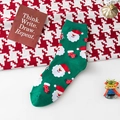 Chaussettes de Noël vertes avec motif Père Noël et pois festifs colorés - Taille unique / Vert