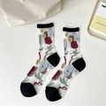 Chaussettes vintage en mesh transparent avec broderie florale et talons renforcés noirs - Taille unique / Floral Partout - Revers Noir