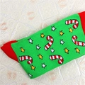 Christmas socks in green with red heel featuring candy cane and star knitted patterns - One Size / Candy Cane Star