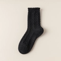 Thick black coral fleece thermal socks with cable knit texture for winter comfort - One Size / Black