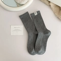 Gray ribbed knit mid-calf socks with retro dog label and speckled yarn texture - One Size / Medium Grey