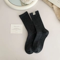 Dark grey speckled ribbed crew socks with a small white graphic label for women - One Size / Dark Grey