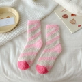 Pink and white striped coral fleece socks in cozy home setting with warm plush texture - Pink Stripe
