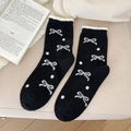 Calze termiche in pile nere con jacquard a fiocco bianco e bordo in peluche - Nero