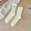 Calze autoreggenti in pile corallo color crema con elegante ricamo a fiocco nero - Taglia unica / Giallo