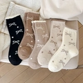 Five pack of thick bow-patterned coral fleece socks in assorted neutral winter colors - Multicolor
