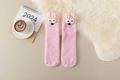Close-up of pink coral fleece socks featuring cute 3D cartoon animal details and soft texture - One Size / Pink