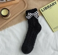Calcetines gruesos de forro polar coral negro con un lazo elegante con diseño de pata de gallo - Talla única / Negro