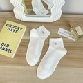 White cotton ribbed socks featuring delicate dog embroidery in a Korean style design - One Size / White