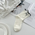 Cream knit mid-calf socks with black ruffle trim and plaid bow detail for women - One Size / White with Bowknot