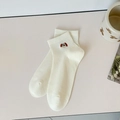 Creamy white cotton ankle socks featuring cute puppy embroidery and ribbed cuff design - One Size / Off-white