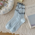 Light blue slouch socks featuring grey ruffled edges and delicate bow embroidery detail - One Size / Blue