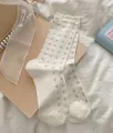 White floral mesh cotton mid-calf socks with elegant ruffle cuffs in Japanese style - One Size / Milk White