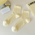 Chaussettes femme jaune pâle avec texture pointelle et bords à volants dentelle - Taille unique / Jaune