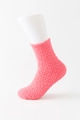 Pink coral fleece thermal socks displayed on a leg model for cozy winter warmth - Orange Red