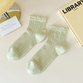 Chaussettes résille en coton vert clair avec tricot ajouré et bordure à volants - Taille unique / Vert
