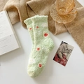 Green coral fleece winter socks with white and orange floral patterns in soft plush - Light Green Floral (Avocado)