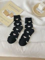 Calcetines gruesos de forro polar coral negro con coloridos corazones para el invierno - Talla única / Negro