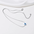 Detalle del collar de ojo turco plateado con cierre de langosta y cadena de extensión - Color Acero