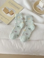 Soft coral fleece heart socks in light green plush material for winter warmth - One Size / Green