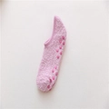 Fuzzy pink coral fleece floor socks with non-slip silicone grips for indoor warmth - One Size / Light Pink