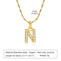 Collier avec pendentif lettre N dorée en acier inoxydable et oxydes de zirconium - Lettre N
