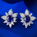 Classic S925 silver stud earrings featuring oval blue corundum and floral halo crystals - 925 Silver / Blue Zirconia (E333)