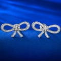 Eleganti orecchini a fiocco in argento 925 con pavé di zirconi bianchi brillanti e lucidi - Fiocco / Argento 925