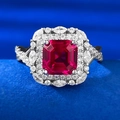 Luxurious S925 silver ring with emerald-cut ruby centerpiece and floral diamond halo - US 5 / Red Zirconia Style (R707)
