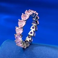Elegant S925 silver ring featuring pink heart-shaped stones on blue silk fabric - US 7 / Pink
