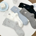 Five pairs of cotton crew socks with animal embroidery and bow patterns in soft colors - One Size / Random Mix