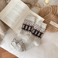 Winter wool socks featuring Fair Isle Christmas tree patterns in cream and brown tones - One Size / Beige