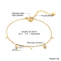 Dettaglio della catena in acciaio inossidabile dorato con zirconi cubici scintillanti - Bracciale Dorato (Lunghezza 16+4cm)