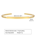 Verstellbarer goldener Edelstahl-Armreif mit gedrehtem Design und poliertem Element - Innendurchmesser 60mm / Gold