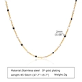 Dettaglio della collana in acciaio dorato con perline smaltate bianche e nere da 2mm - Collana Dorata - Perline Nere e Bianche (NC-1236GBW)