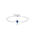 S925 sterling silver bracelet featuring an oval sapphire centerpiece with starburst diamonds - 925 Silver / Blue