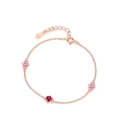 Pulsera de plata S925 en oro rosa con circonitas rosas sobre un fondo blanco - Plata 925 / Oro Rosa