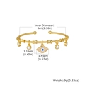 Detail of twisted gold bangle featuring blue evil eye and zircon round pendants - PBR-349G02 / Gold (Rhinestone Eye Pendant)