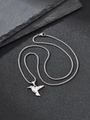 Macro detail of a silver hummingbird pendant with intricate feather textures on a dark chain - Silver Pendant With Chain