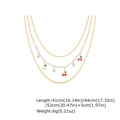 Vue détaillée du collier à plusieurs rangs avec pendentif cerise et perles blanches - Doré