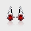 Detailed macro view of 925 sterling silver drop earrings with faceted red round stones - Round Red Rhinestone Vintage Hoop Earrings (KDP855)
