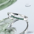 925 silver open ring with vibrant green emerald stones on a reflective blue surface - Adjustable Open Style / Green (KDP1294)